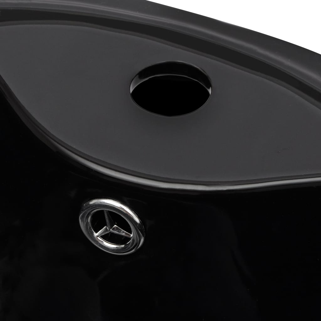 Ceramic bathroom sink with tap and overflow hole, round, black